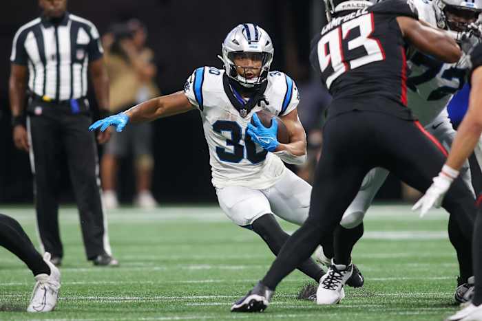 Sep 10, 2023; Atlanta, Georgia, USA; Carolina Panthers running back Chuba Hubbard (30) runs the ball against the Atlanta Falcons in the second half at Mercedes-Benz Stadium.